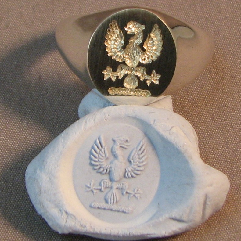 Phoenix eagle crest impression in blue tack